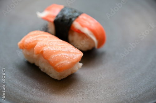 Salmon sushi on plate of japan
