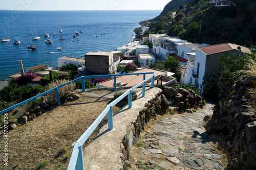 Italy Sicily Aeolian Islands, Alicudi Island, panoramic view of the town and the harbor photo