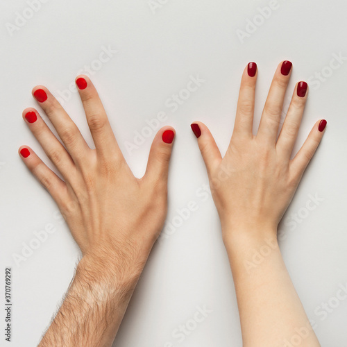 female and male manicure. hands close up