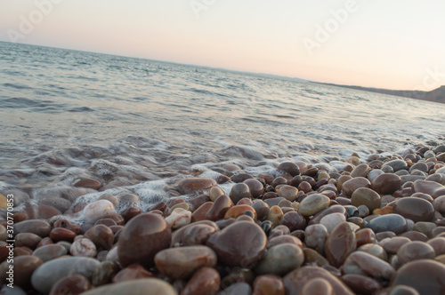 Waves washing over pebble beach