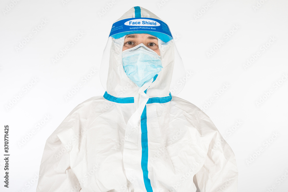 Doctor woman wearing PPE to fight coronavirus on white background. Warrior. COVID medicine concept Doctor woman wearing PPE to fight coronavirus on white background. Warrior. COVID medicine concept