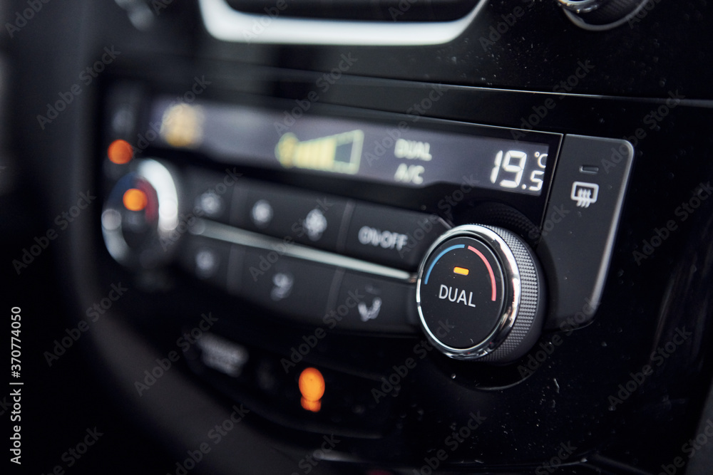 Radio panel. Modern new luxury automobile interior. Design and technology