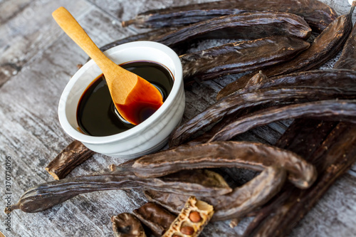 Carob molasses and carob po...