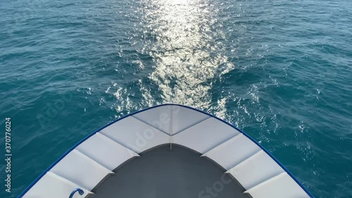 The ship sails at sea. View in front of the ship.