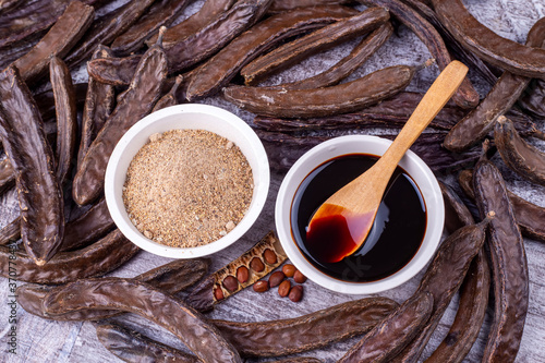 Carob molasses and carob po...