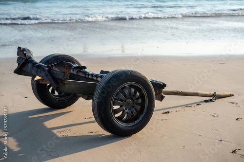 Trolley with large wheels for launching boats on the beach