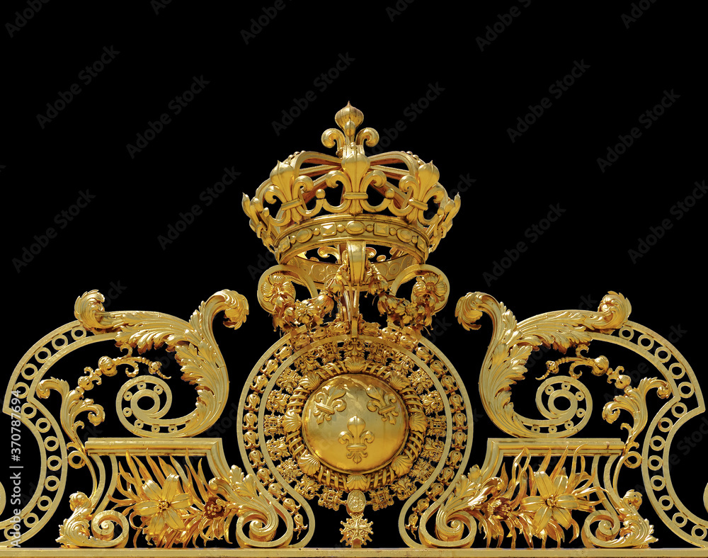 Isolated Close-up view of golden ornate gate of Chateau de Versailles - Versailles, France Isolated Close-up view of golden ornate gate of Chateau de Versailles - Versailles, France