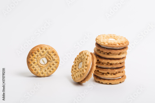 Cream sandwich biscuits on white background
