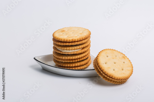 Cream sandwich biscuits on white background