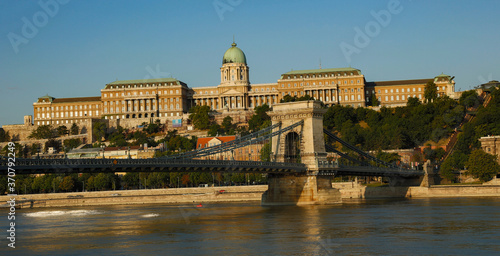 Looking accross the Danube river at the Szechenyi Chain Bridge and Buda castle and National museum, Budapest, Humgary