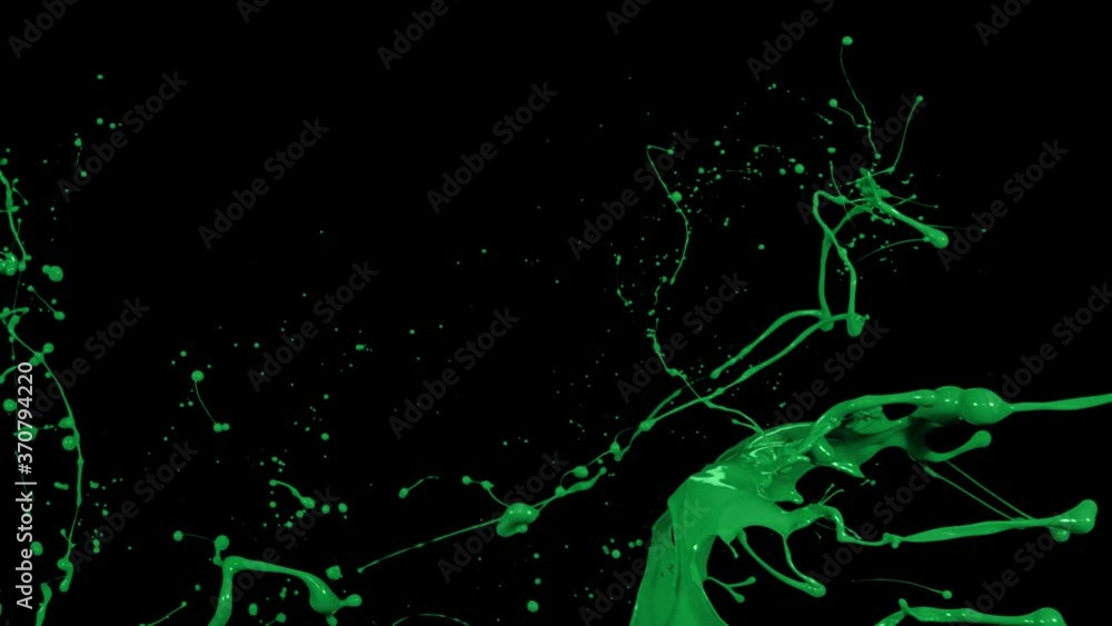 Green paint splash thrown in slow motion, liquid isolated on black (4K) Green paint splash thrown in slow motion, liquid isolated on black (4K)