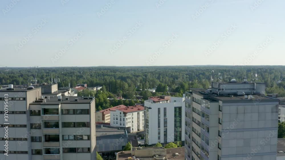 Reverse fly through aerial view of two large towers in a Finnish city near Helsinki. Reverse fly through aerial view of two large towers in a Finnish city near Helsinki.