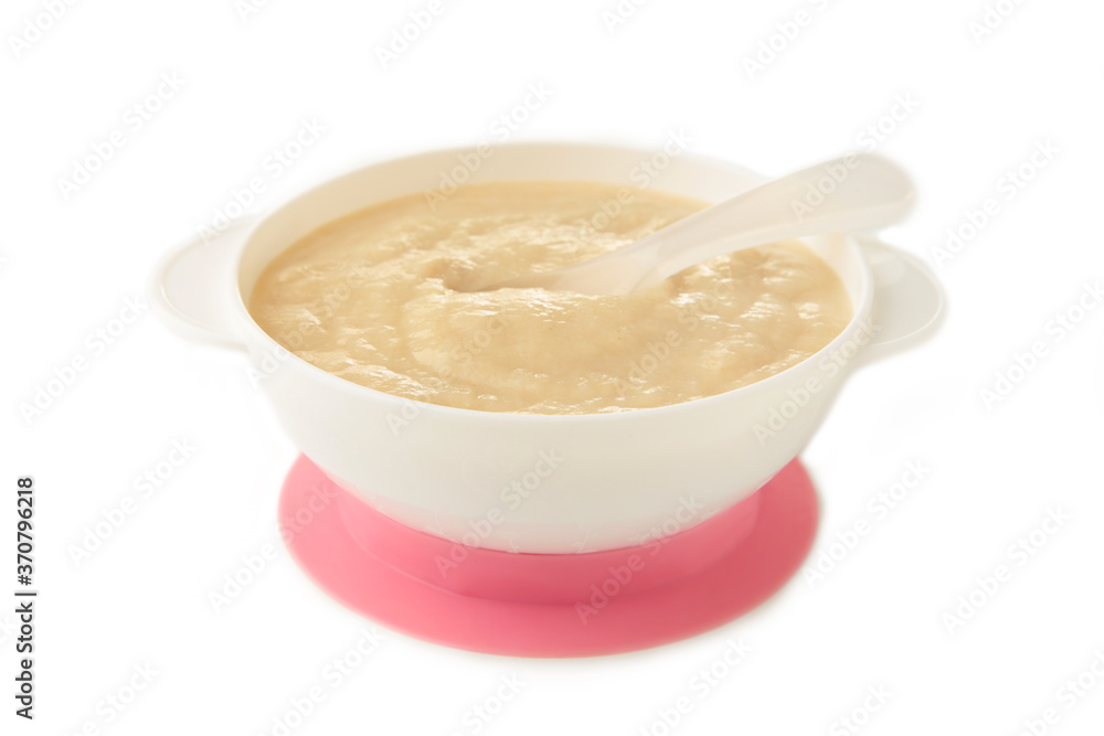 Baby porridge on plate isolated on white background Baby porridge on plate isolated on white background