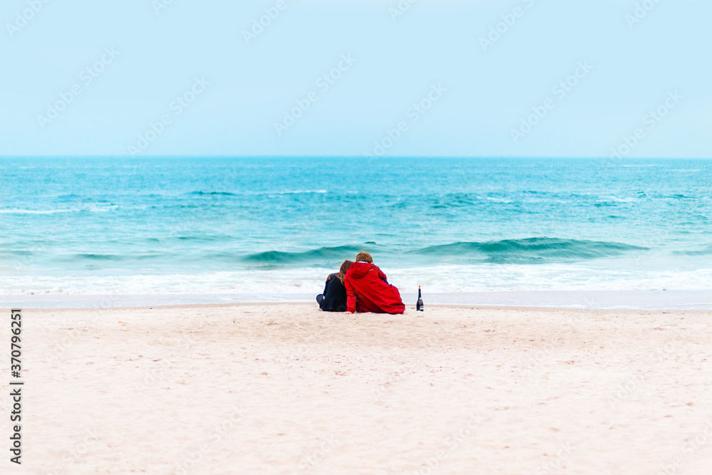 Happy young couple spending time on the beach. Happy young couple spending time on the beach.