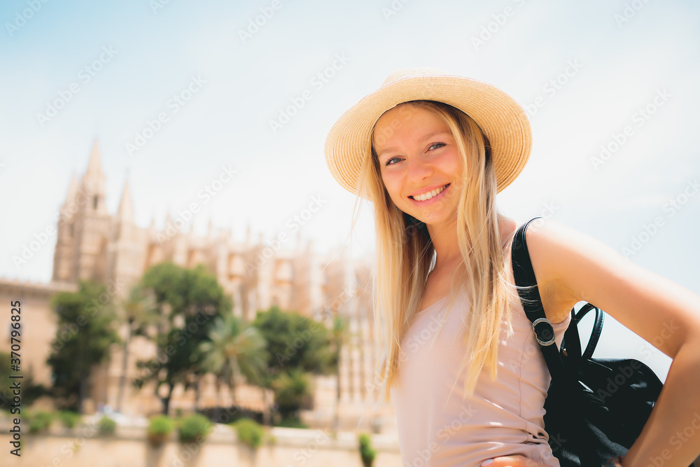 Adventure time - Attractive caucasian girl tourist in hat exploring new city at summer