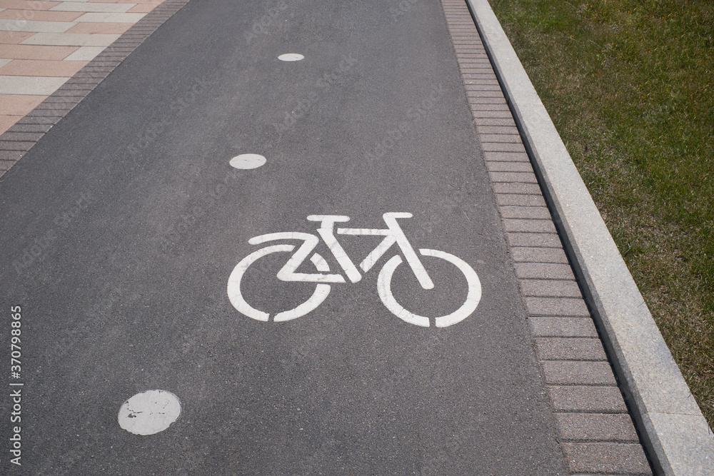 Fototapeta premium bike lane, road for bicycles, Bicycle road sign and arrow