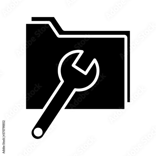 folder with wrench key tool silhouette style icon