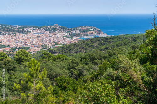 Views of the Mediterranean Sea and the city of Sant Feliu dels Guixols from the "Massis de les Cadiretes".