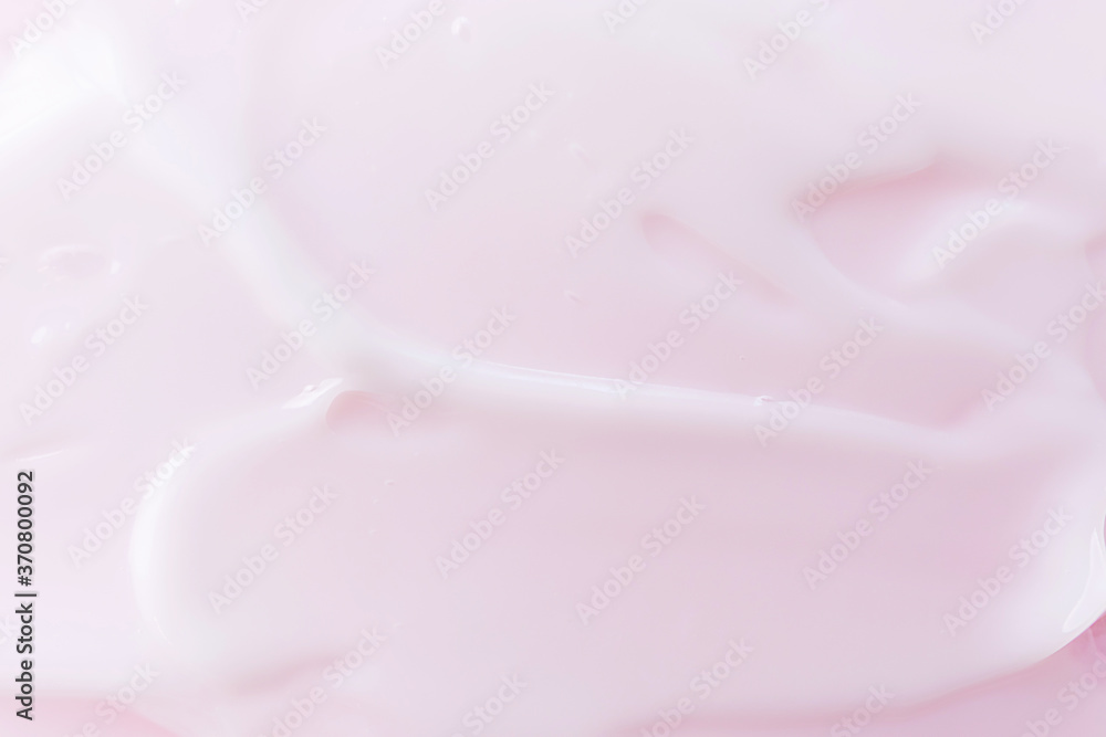 Cosmetic cream close-up. Macro photo. Soft focus. The concept of cosmetic products, skin and hair care, beauty and health. Background image in trendy pink. Cosmetic cream close-up. Macro photo. Soft focus. The concept of cosmetic products, skin and hair care, beauty and health. Background image in trendy pink.