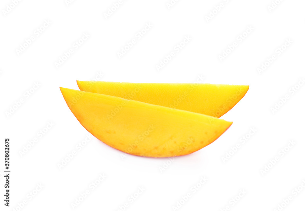 Slices of ripe mango isolated on white. Exotic fruit Slices of ripe mango isolated on white. Exotic fruit