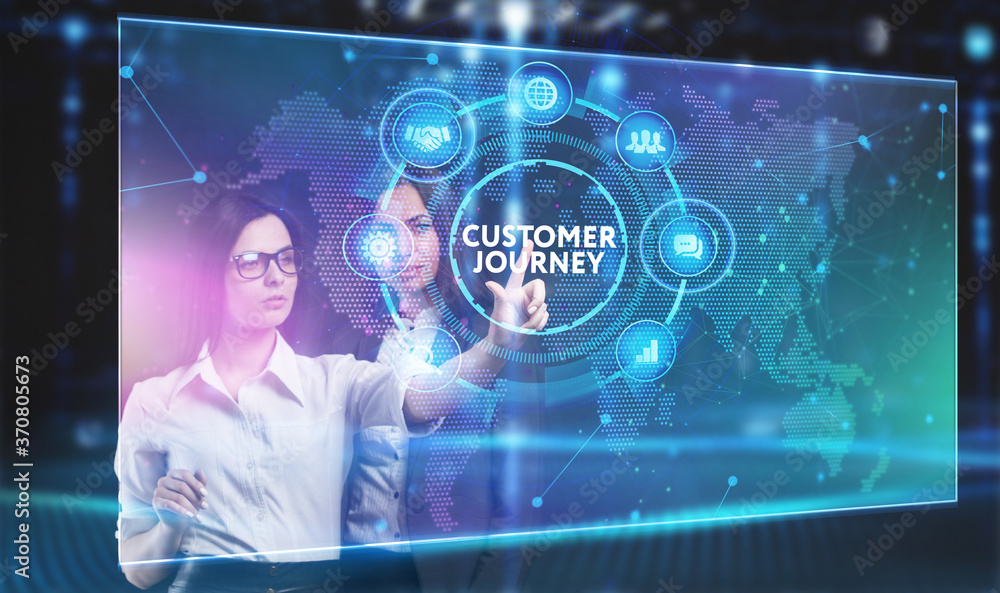 Business, Technology, Internet and network concept. Young businessman working on a virtual screen of the future and sees the inscription: Business, Technology, Internet and network concept. Young businessman working on a virtual screen of the future and sees the inscription: