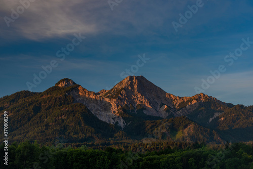 Red Mittagskogel hill in summer fresh blue sky morning