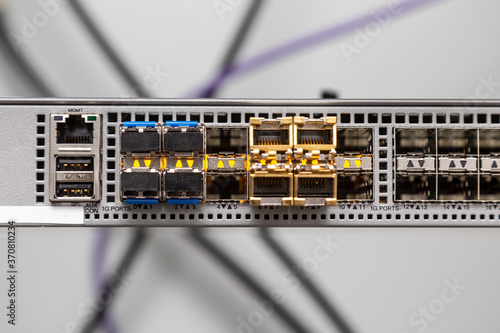 Empty ports for connecting fiber optic cables close-up. Horizontal orientation.