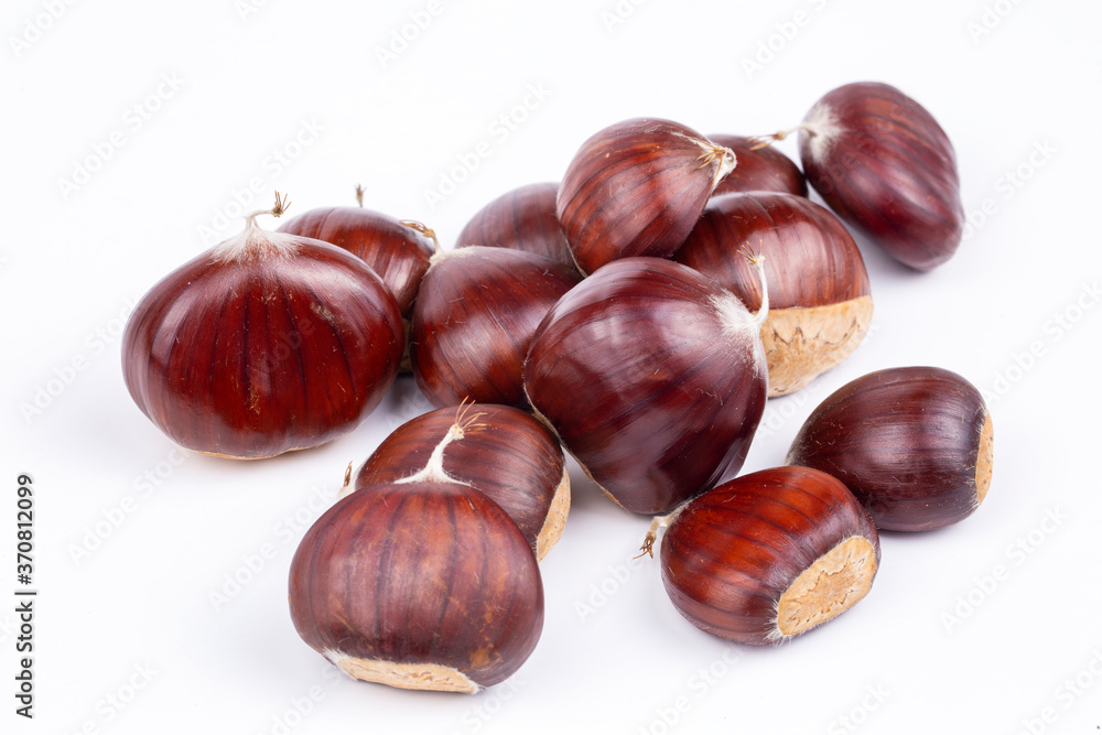 Chestnut Isolated. Roasted sweet chestnuts for Christmas on white background. Top view. Chestnut Isolated. Roasted sweet chestnuts for Christmas on white background. Top view.