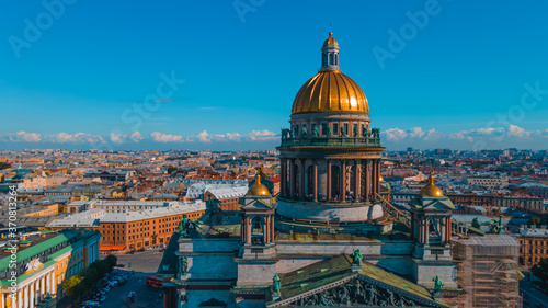 Aerial view of the Kazan Cathedral on a clear summer day  the copper dome  gold cross  columns  Nevsky Prospekt  the singer s house  Griboyedov Canal  Herzen University