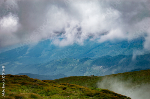 Carpathian Mountains. Panorama of green hills in summer mountain © Eugene B-sov