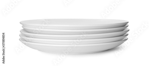 Stack of clean plates isolated on white