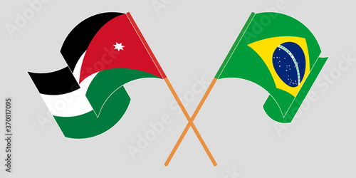 Crossed and waving flags of Jordan and Brazil photo