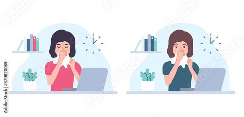 Young woman with flu has a runny nose. Sitting at laptop in office. Sick employee blowing her nose
