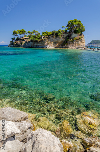 Fototapeta Naklejka Na Ścianę i Meble -  ZAKYNTHOS, GREECE – JULY 19, 2020: Picturesque Cameo island in Agios Sostis, situated on Laganas bay on the south of Zakynthos island on Ionian Sea, Greece.