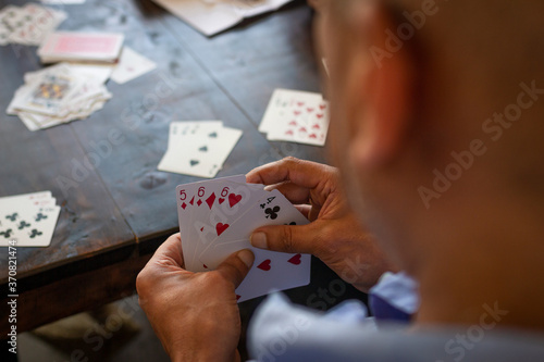 Medellin, Antioquia / Colombia. September 17, 2019. People playing card game card (Detail)