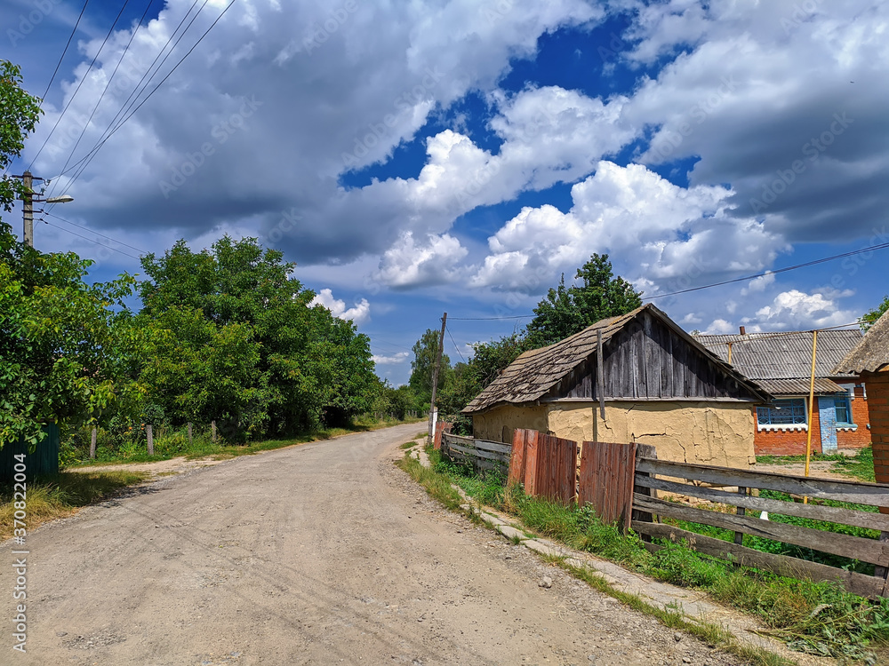 Fototapeta premium typical landscape of the Ukrainian village in summer