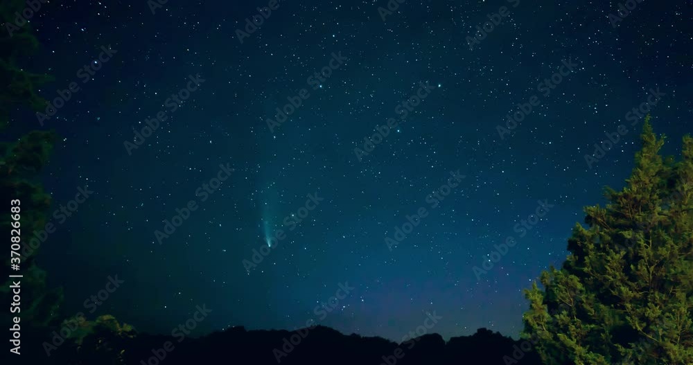 Time lapse of comet Neowise moving across a starry sky during aurora borealis Time lapse of comet Neowise moving across a starry sky during aurora borealis