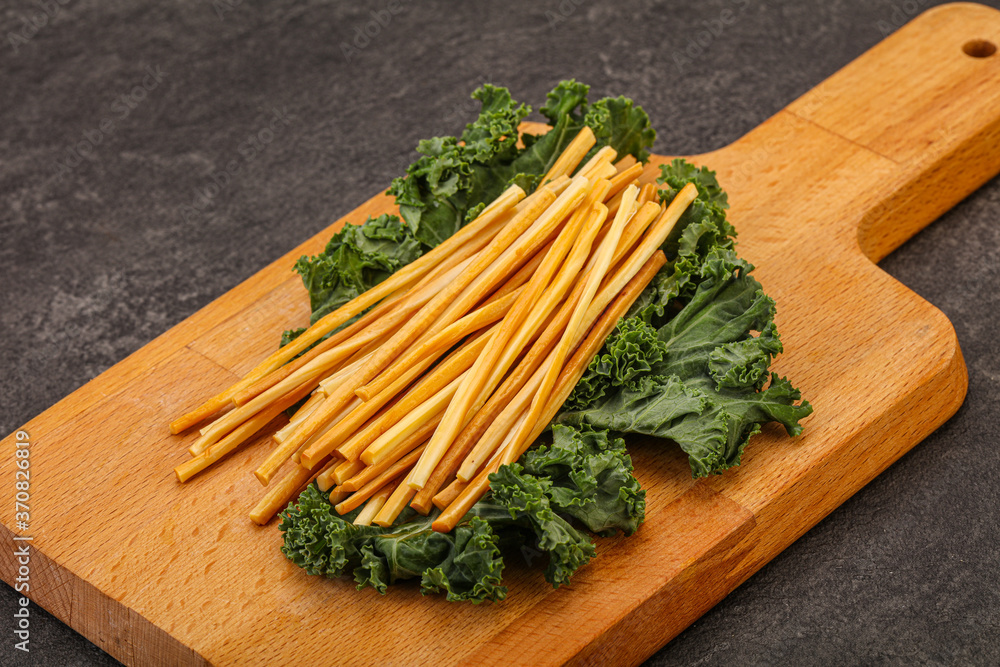 Chechel cheese sticks over board