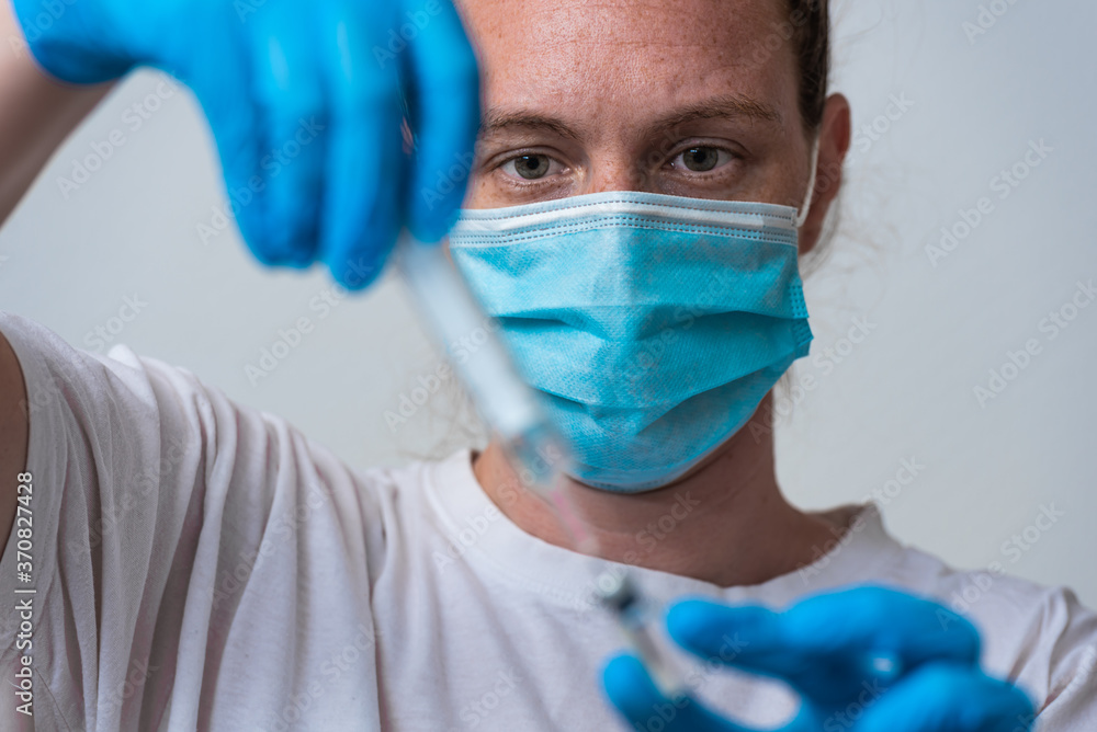 Medical worker preparing vaccine for corona-virus Medical worker preparing vaccine for corona-virus