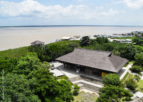 View of a high spot in Mangal das Garças. A building in the middle of the mangrove and Guajará Bay, in Belém, Brazil. photo
