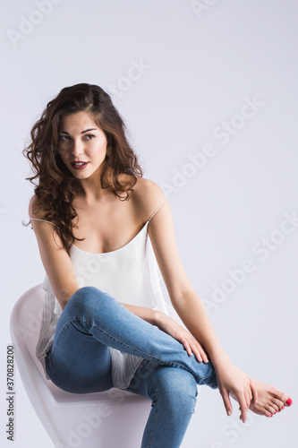 Portrait of a beautiful smiling woman in studio.