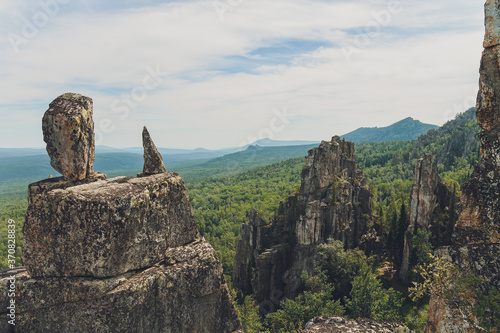 Rocks of Aigir in the smoke of a forest fire. Bashkortostan. photo