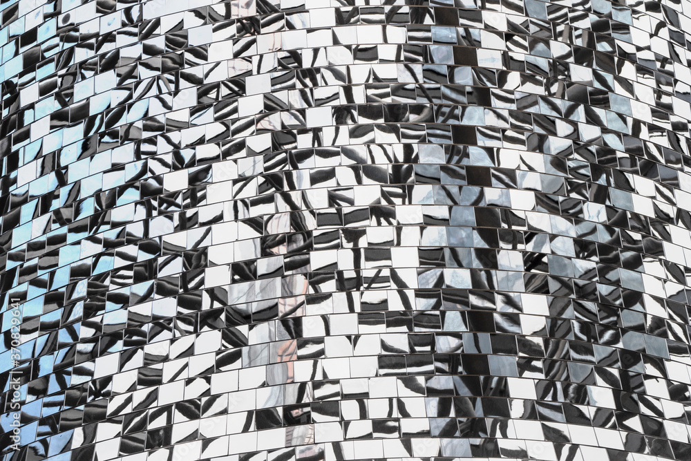 Fototapeta premium Mosaic of mirror pieces with reflection. Abstract mirror background made up of mirror fragments