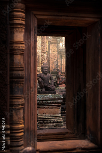 Historic stone statues in Banteay Srei Buddhist temple located in Cambodia