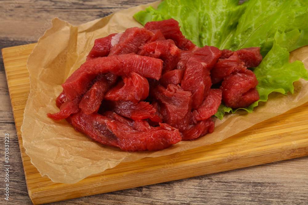 Raw beef meat sliced for cooking Raw beef meat sliced for cooking