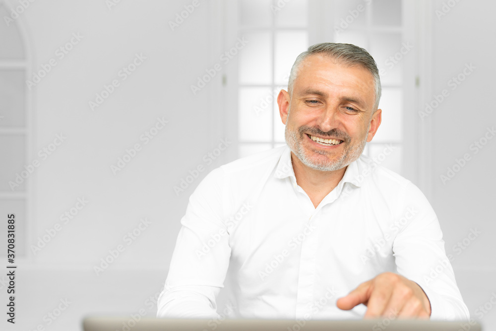 Smiling european employee have video call on laptop
