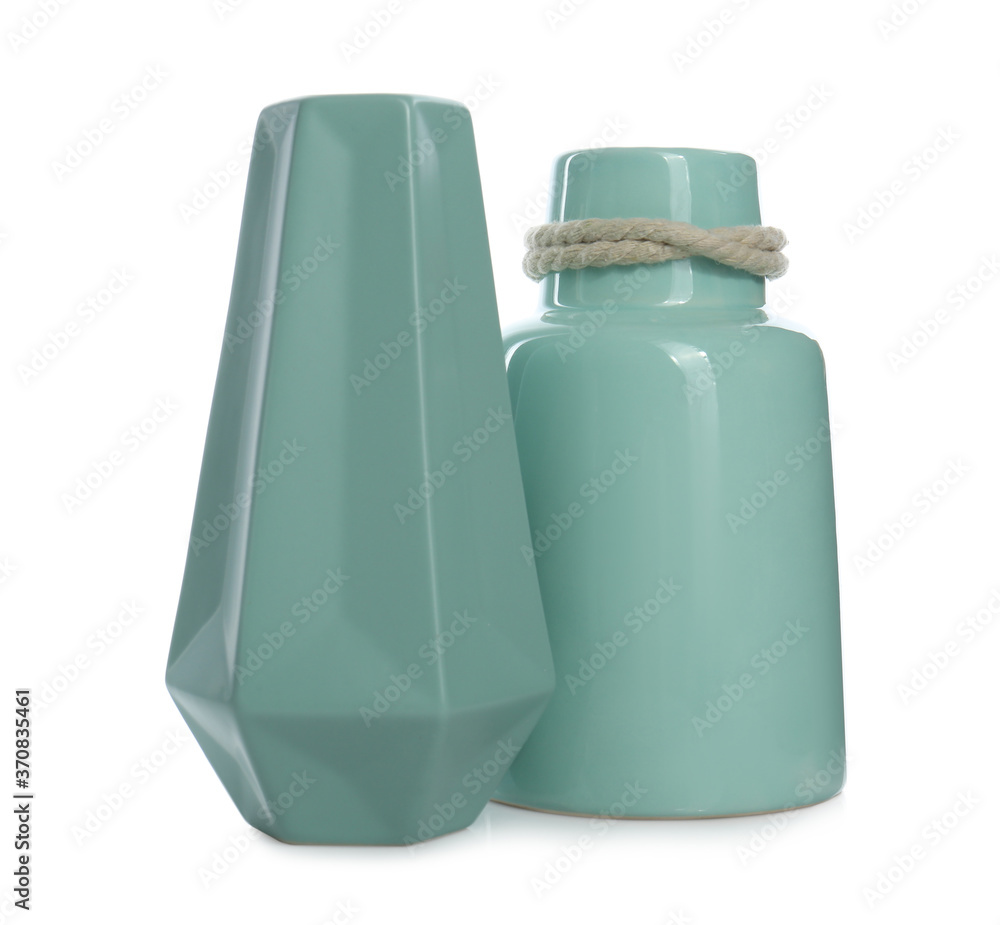 Stylish empty ceramic vases isolated on white Stylish empty ceramic vases isolated on white