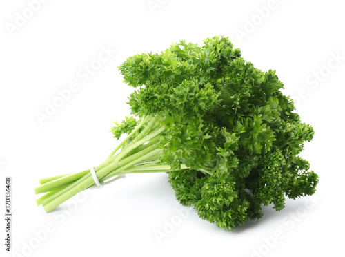 Bunch of fresh curly parsley on white background