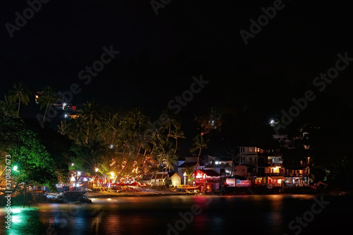 Night life scene on Unawatuna Beach in Sri Lanka