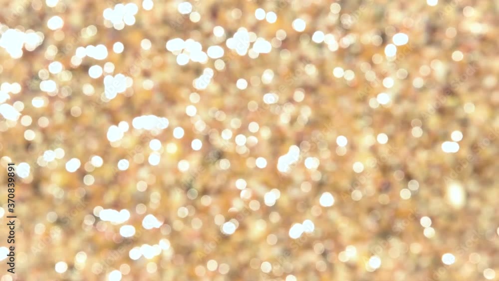 Abstract golden festive background with bokeh defocused lights. Video background Abstract golden festive background with bokeh defocused lights. Video background